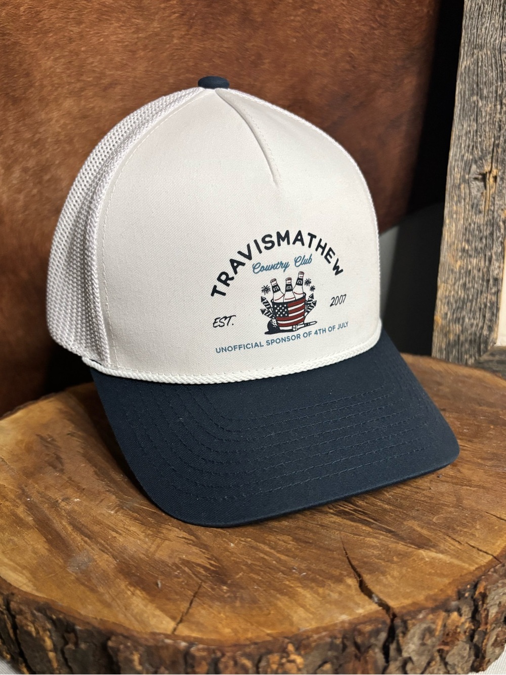 TravisMathew White and Navy Trucker Hat with Graphic Logo
